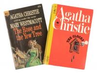 Two paperback editions of works by Agatha Christie, each signed by the author