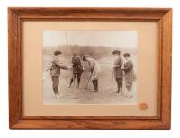 Four ladies and a caddie on the green