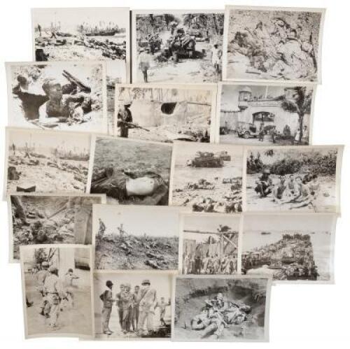 Approximately 90 photographs of troops and fighting in the Philippines during the Second World War, with massacres, mass graves, etc.