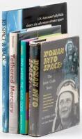 Four books signed by women astronauts