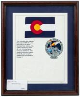 Small Colorado state flag, flown in space aboard the Space Shuttle Orbiter Atlantis