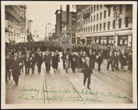 Signed photograph of labor activist Tom Mooney marching on Market Street following his release from San Quentin, 1939