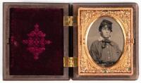 Ninth plate ambrotype of young boy with military cap housed in thermoplastic union case