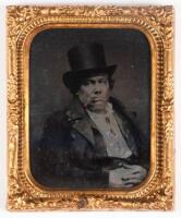 Ambrotype of seated gentleman in top hat smoking a cigar, uncased