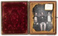 Quarter plate daguerreotype of three seated gentlemen housed in spray of flowers papier-mache case inlaid with mother-of-pearl