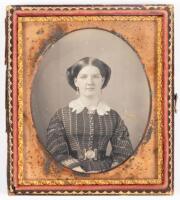 Daguerreotype portrait of young woman in fancy dress with lace collar and large belt buckle