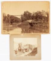 Steam Locomotive and Railroad Bridge Over River