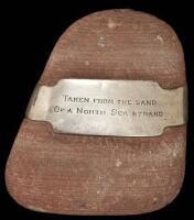 Silver-banded stone given from one bibliophile to another