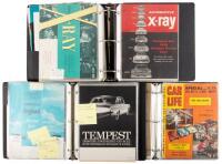 Three binders of vintage automobile manuals, car advertising, magazines, racing programs and other automobile ephemera from the collection of Albert Neiman