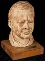 Terra-cotta finished ceramic portrait bust of Arnold Palmer, signed