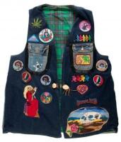 Jean jacket/vest from the Hippie era, with decals, embroideries and other features