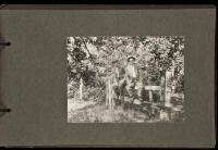 Album containing ninety-two original photographs of people and places in Iowa