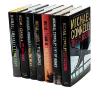 Seven novels by Michael Connelly, all inscribed