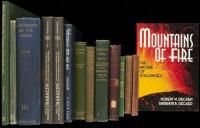 Shelf of over fifty volumes, most about volcanoes, some on geology