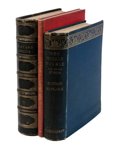 Three volumes containing works by Rudyard Kipling