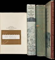 Four volumes signed by Sir Edmund Hillary