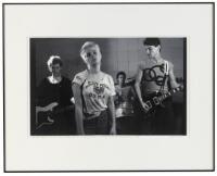 The Avengers: Jimmy Wilsey, Penelope Houston, Danny O'Brien, and Greg Ingraham Rehearsing 1977 [with] a folding poster with the image signed by Penelope Houston [and] original Avengers show flyer at Mabuhay Gardens