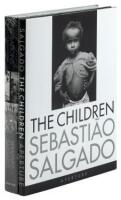 Two photography volumes by Sebastião Salgado