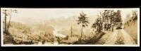 Panoramic sepia-tone photograph of mining engineer J.O. Gillice, mine owner Henry J. Bartlett, John Bergin and another looking over the Trinity River