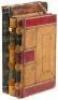 Three large manuscript ledger books recording court cases in Placer County, California, from 1855 to 1864