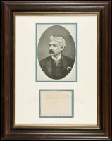 Autograph note signed and framed along with a photographic print of the author