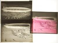 Three photograph negatives of the USS Akron flying over San Francisco Bay