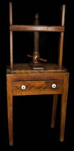 Antique wooden nipping press