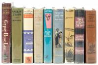 Shelf of mysteries by Gypsy Rose Lee, Emma Lathen, Marie Belloc Lowndes and others.