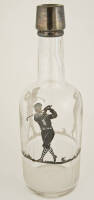 After shave bottle with sterling silver overlays with image of golfer on the sides