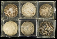 Six vintage golf balls