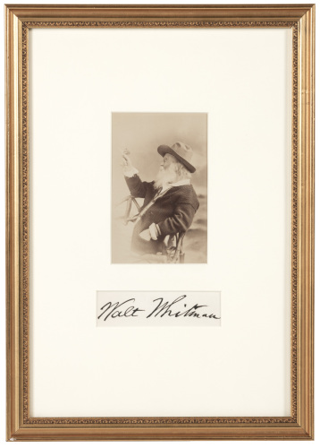 Portrait of Walt Whitman holding a butterfly, matted with large signature