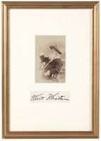 Portrait of Walt Whitman holding a butterfly, matted with large signature