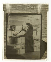 Photographic negative of Eleanor Roosevelt serving in a soup kitchen