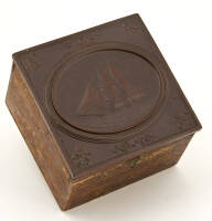 Collar box, top featuring embossed image of Yacht America