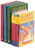 First three deluxe Harry Potter editions - Volume I signed by J.K. Rowling