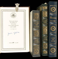 Four signed volumes by John Updike