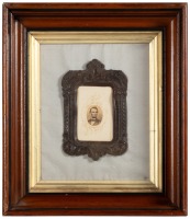 Albumen photograph portrait of Abraham Lincoln mounted on carte-de-visite with patriotic embossing