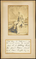 Autograph passage in Whitman's hand, matted with photograph