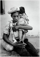 Man with his ill daughter, El Salvador