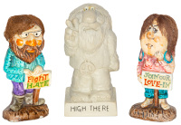 Three novelty hippie figurines