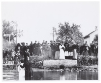 Negro Baptism in Fox river at foot of Lake St., Elgin, Ill., about 1900