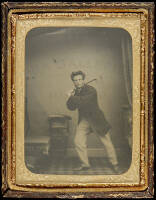 Ambrotype portrait of golfer in studio setting