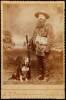 Cabinet Card of a late 19th century sportsmen with a Winchester Model 1886 Rifle and his hound dog