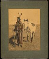 Hand-tinted photograph of Lakota Chief Crow Dog