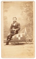 Carte-de-visite of L.P. Federmeyer, famed for pushing a wheelbarrow across the U.S.A., with his wheelbarrow