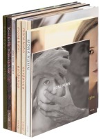 Seven signed volumes of Mona Kuhn