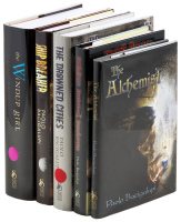Five signed volumes by Paolo Bacigalupi
