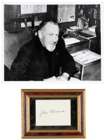 Clipped autograph by John Steinbeck with portrait