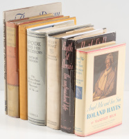 Shelf of books on various arts