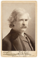 Cabinet card photo portrait of Mark Twain inscribed and signed twice by Twain with an aphorism.